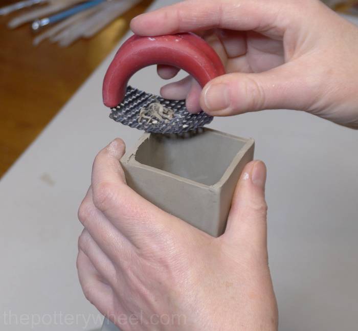 shredding the neck of the donut vase