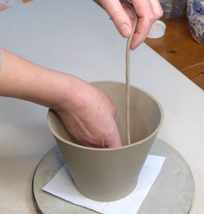 adding a coil to the bottom of the jug