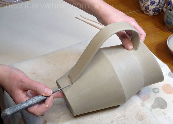 marking where the handle goes on the jug