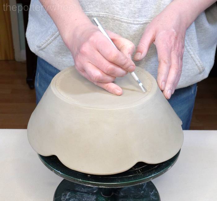 scoring the base of the bowl