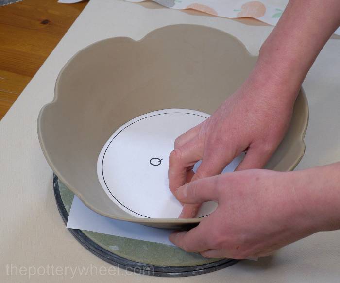 shaping the base of the bowl