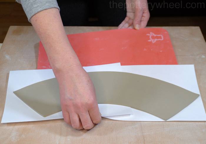 sliding the slab onto the drying board