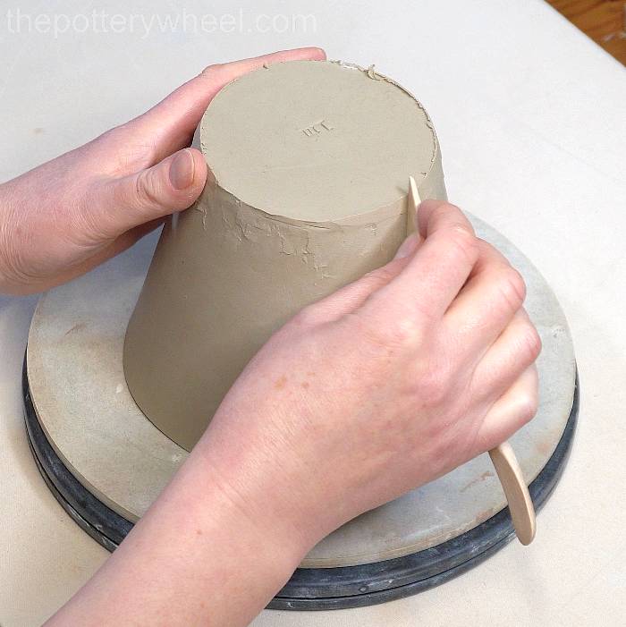 tidying up the base of the jug