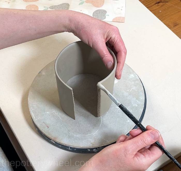 adding clay slip