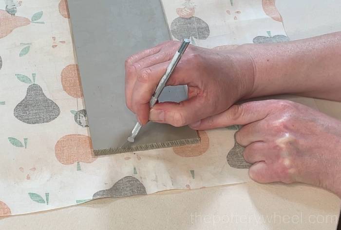 scoring the edge of the slab