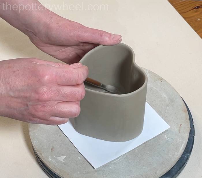 smoothing the inside surface of the join