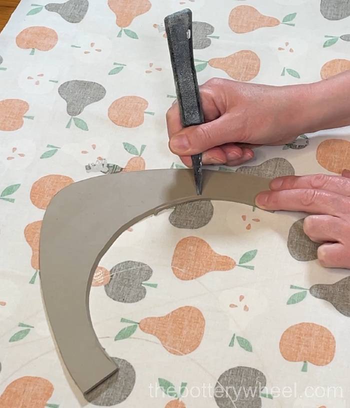 bevelling the bottom edge of the slab jug rim