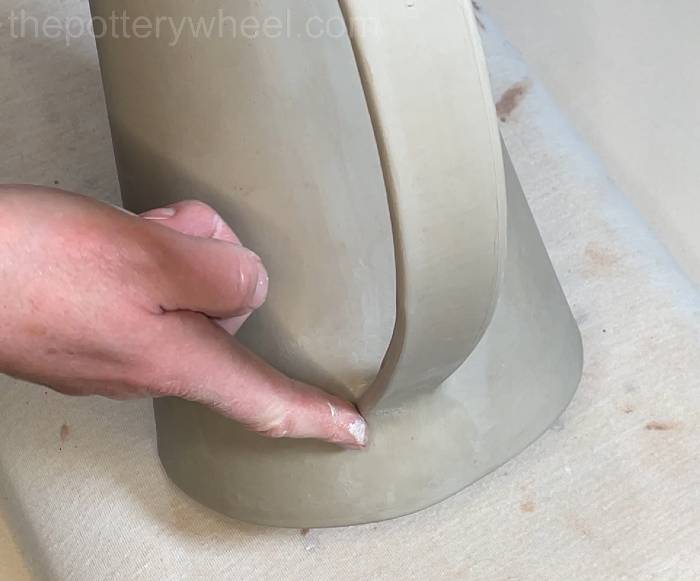 blending a coil around the bottom join on the handle