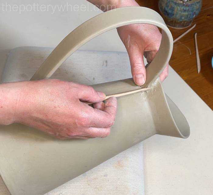 blending the handle onto the flower jug vase