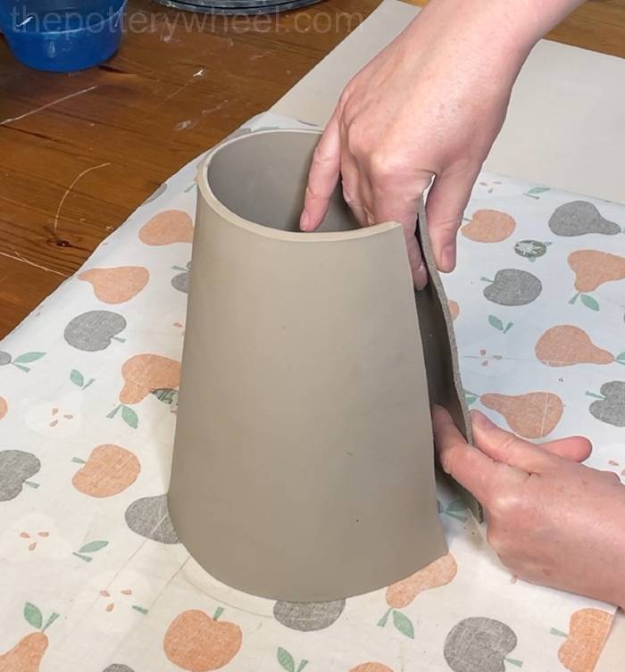 curving the clay slab around