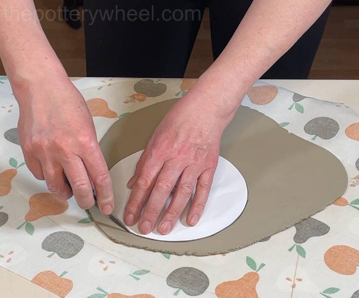 cutting out the base of the flower jug template