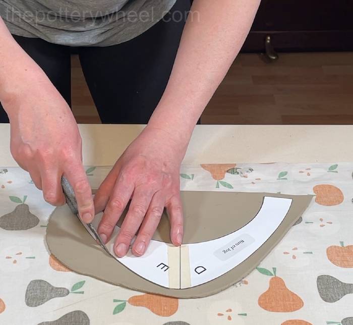 cutting out the rim of the flower jug template
