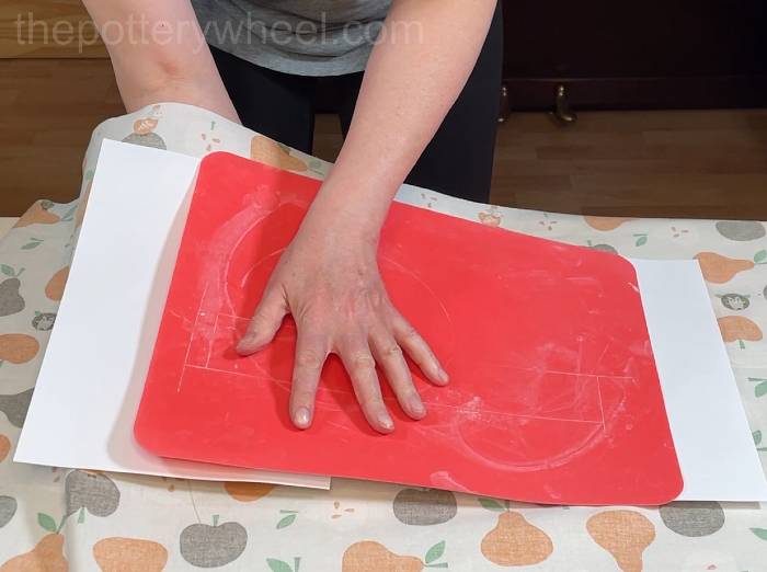 flipping the clay slab over