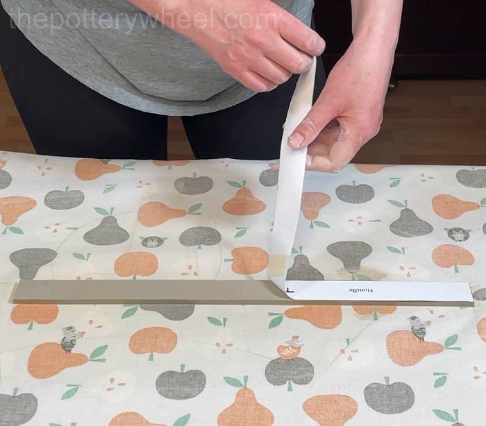 removing the template from the flower jug handle