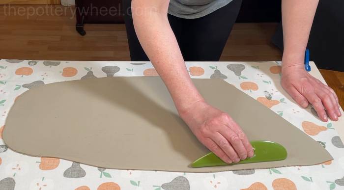 running a rib over the clay slab