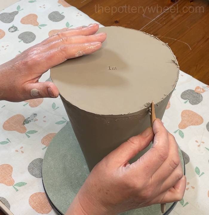 tidying up the join on the flower jug vase