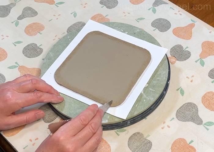Scoring the base clay slab