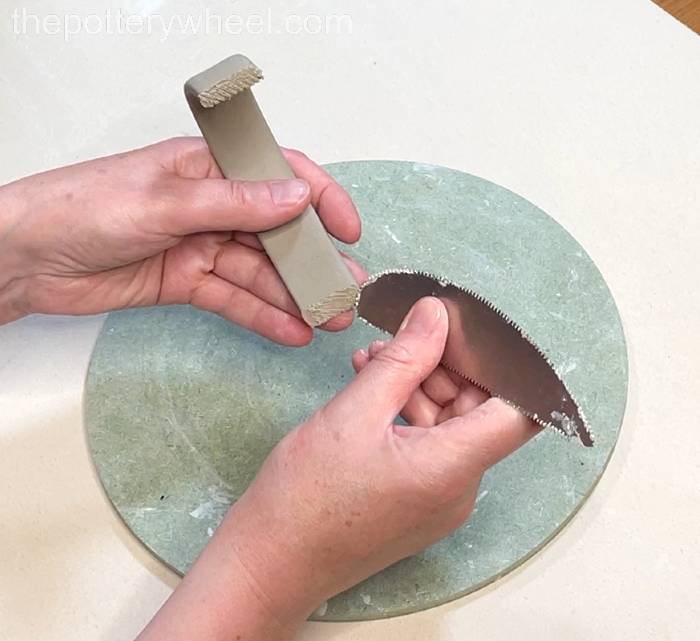 Scoring the handle