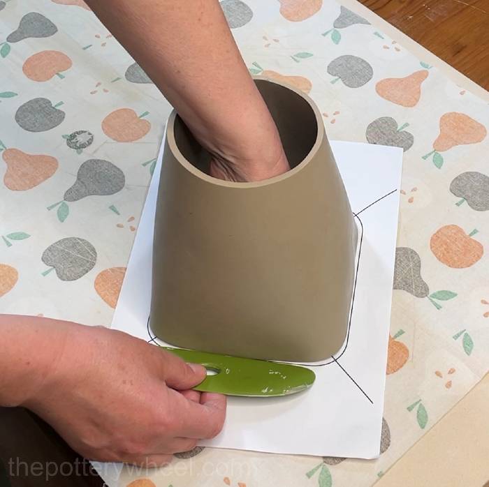 Shaping the sides of the square-based teapot
