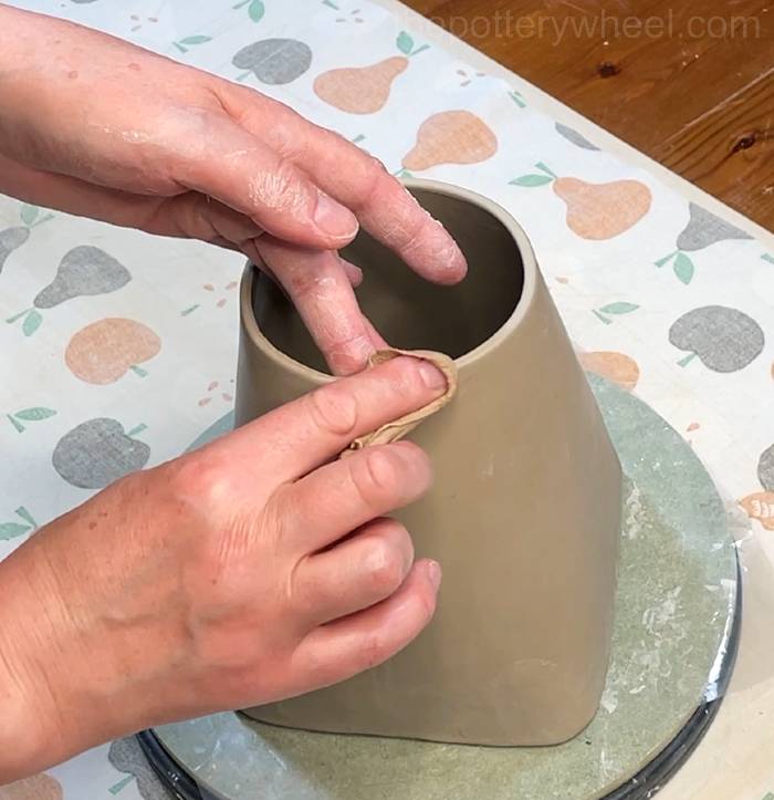Softening the top rim of the teapot