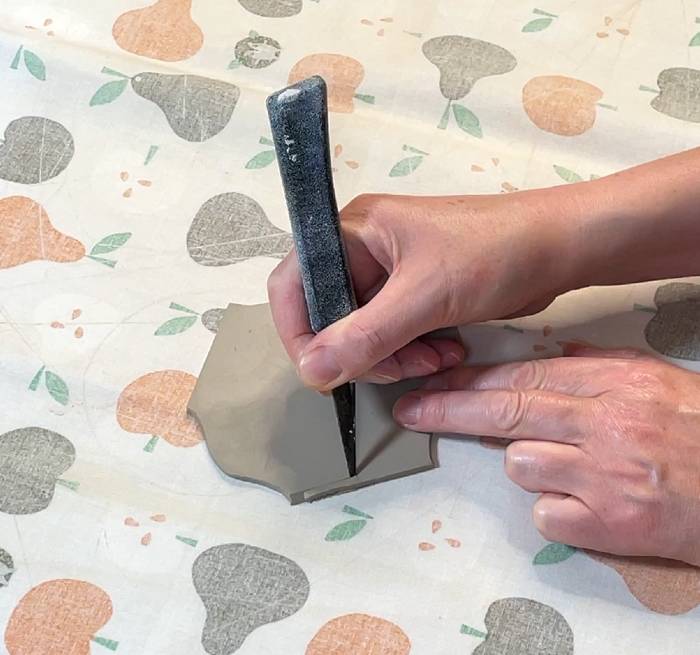 bevelling the edges of the teapot spout