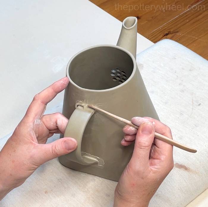 blending a coil around the handle