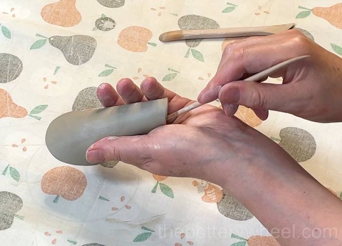 blending the join on the inside of the teapot spout