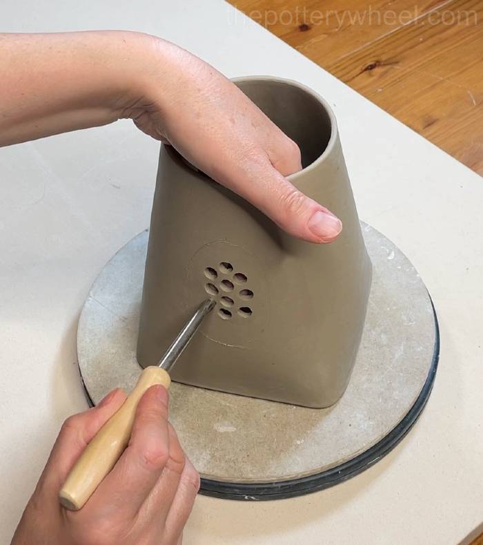 making holes for the spout