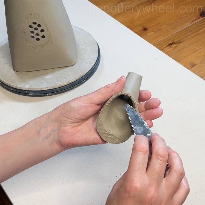 scoring the end of the spout