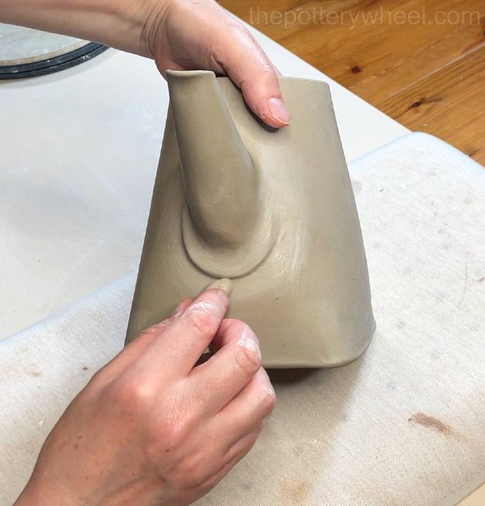 smoothing around the spout