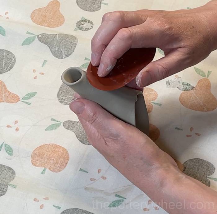 smoothing out the teapot spout