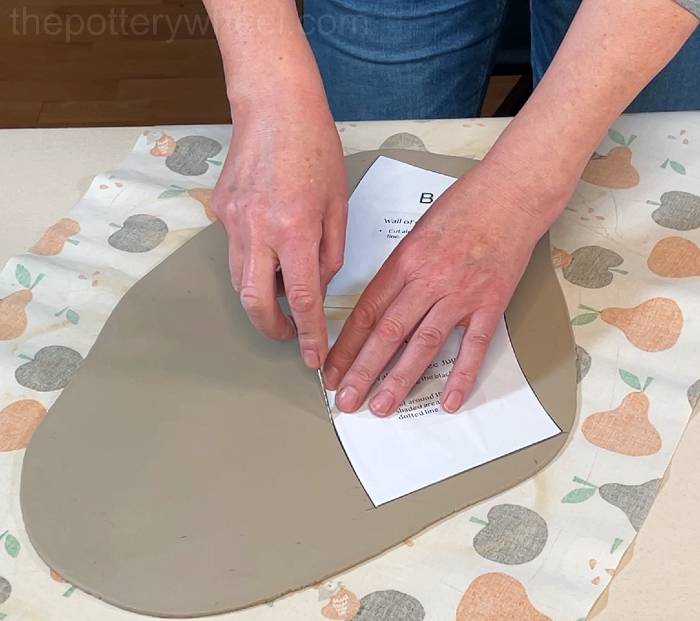 Cutting around the pour-over coffee dripper template