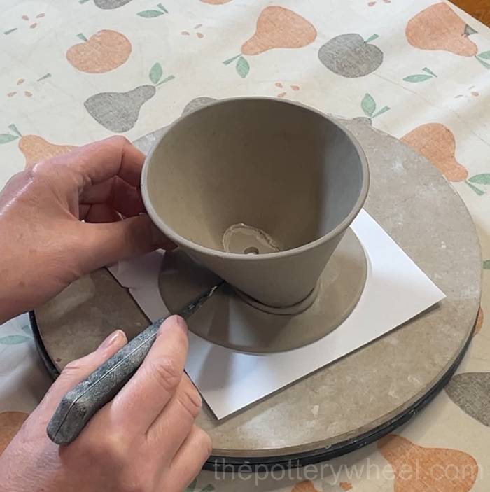 cutting the clay coil to length