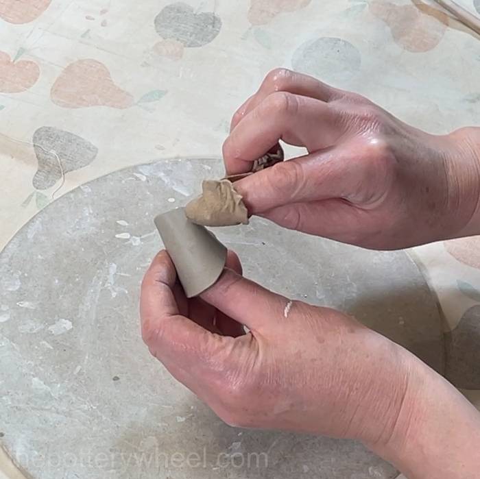 smoothing the surface of the spout