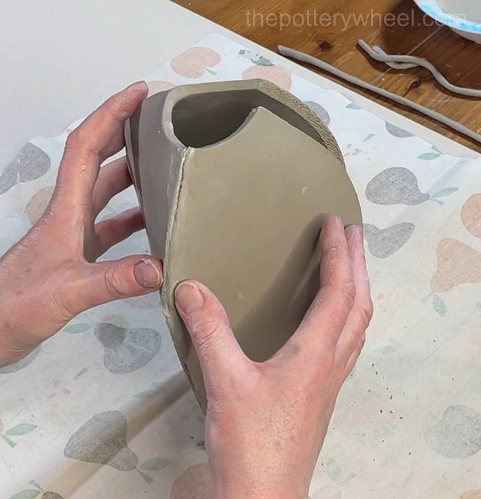 PInching the seam of the clay together