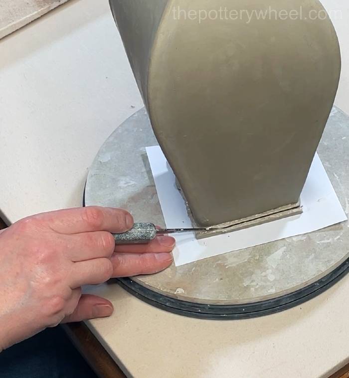 Trimming the base of the vase