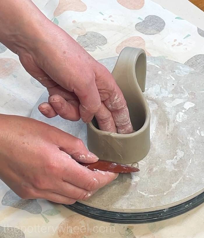 blending the two ends of the neck together