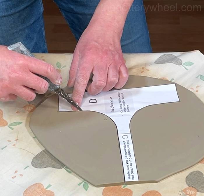 cutting out the neck for the petal shaped vase