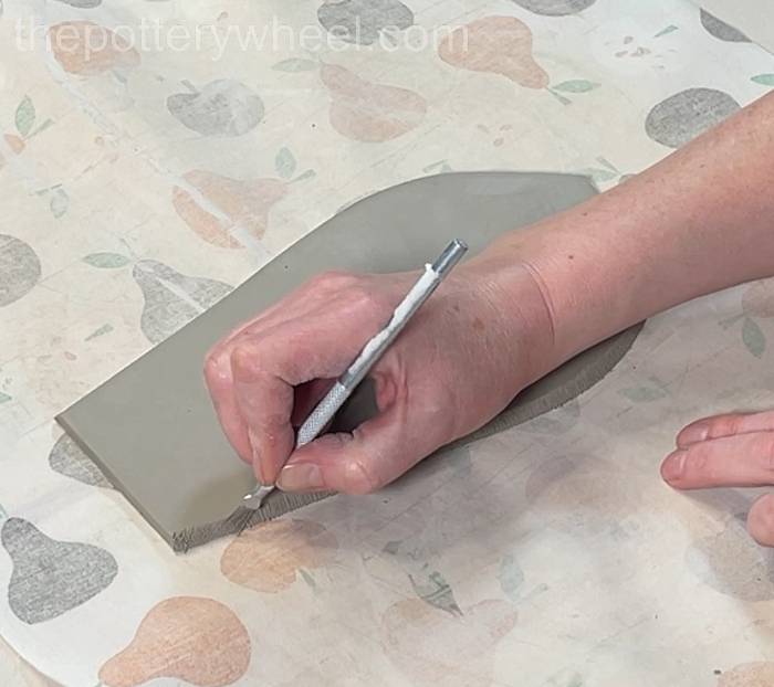 scoring the edge of the slab