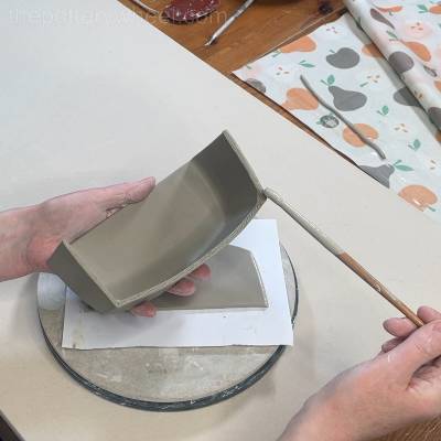 Adding the last long side to the butter dish