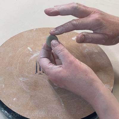 Smoothing the knob of the butter dish