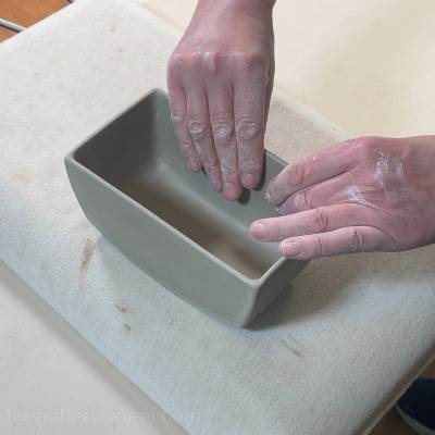 Straightening the edges of the butter dish