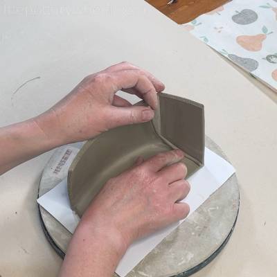 putting a clay coil in the join