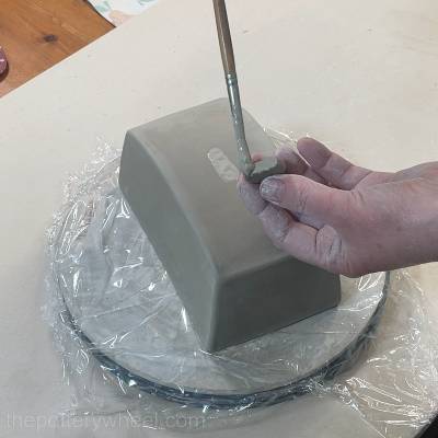 scoring the roof of the butter dish