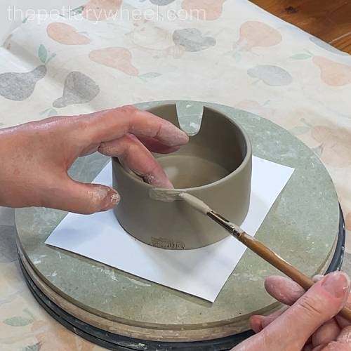 Applying slip where the handle goes