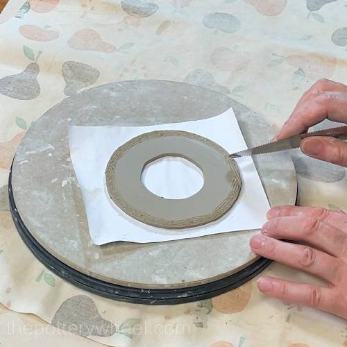 Score around base of the lemon squeezer