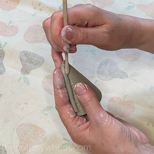 blending the coil onto the side of the cone