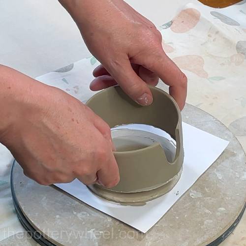 lowering the lemon squeezer wall into place