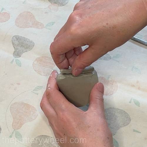 pressing the coil on the cone