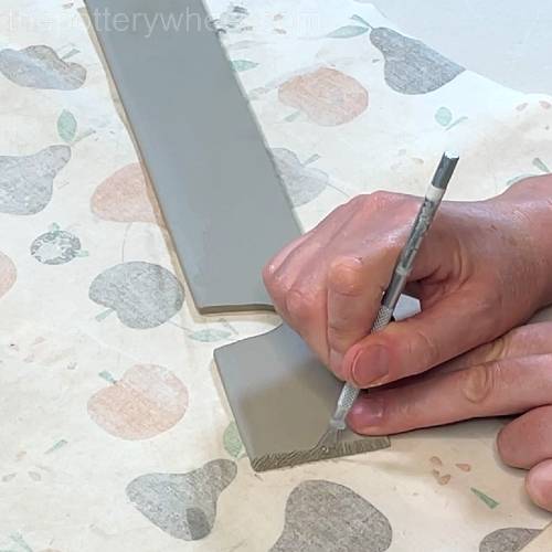 scoring into the bevelled edges